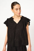 Blus i svart med tea-print
